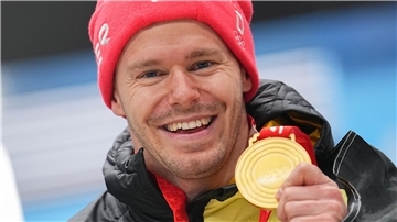 Skeleton-Olympiasieger Grotheer: Olympia 2026 letztes Ziel Alles erreicht: Christopher Grotheer nach seinem Olympiasieg 2022 in Peking.