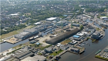 Aus der Luft wird die Dimension des Areals des geplanten Werftquartiers in Bremerhaven deutlich: Hier soll das Werftquartier wachsen.