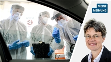 Männer in Schutzkleidung und ein Frauenkopf