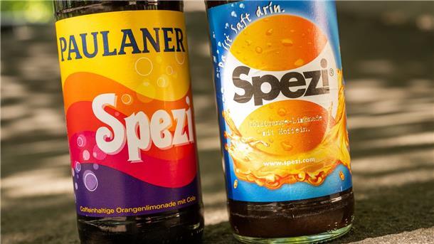 „Spezi“-Streit: Paulaner darf Getränk weiter so nennen Das Kultgetränk „Spezi“ - einmal von der Großbrauerei Paulaner und einmal von der Augsburger Riegele Brauerei. Wem gehört der begehrte Name?