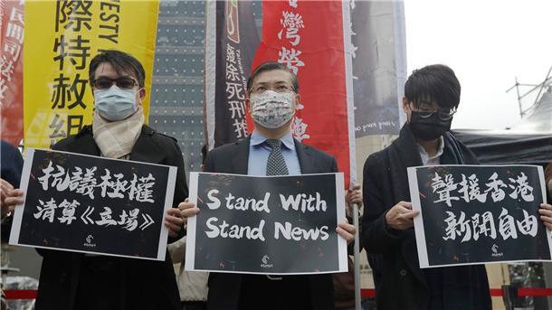 Noch nie so viele Journalisten weltweit im Gefängnis Demonstranten protestieren vor der Bank of China in Taipei.