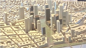 Die im Modell weißen Hochhäuser stehen bereits, die dunkelgrauen wären nach dem neuen Hochhausentwicklungsplan möglich, die hellgrauen waren schon im Plan von 2008 vorgesehen.
