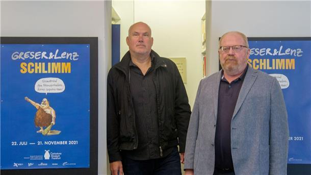 Satirepreis Göttinger Elch für Karikaturisten Greser & Lenz Die Zeichner Achim Greser (r) und Heribert Lenz stehen in einer Ausstellung.