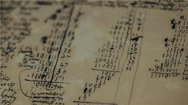 Ein Tastenhandy unter Glas - Die Digitalisierung im Museum Ein Zettel mit Notizen zum binären Zahlencode des Universalgelehrten Gottfried Wilhelm Leibniz.