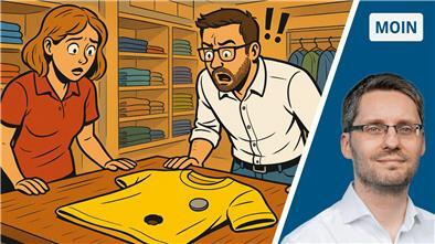 Eine Comic-Zeichnung, die ein gelbes T-Shirt auf einem Tisch zeigt. Im T-Shirt ist ein Loch. Eine Faru und ein Mann stehen an dem Tisch und schauen entgeistert auf das T-Shirt, auf dem eine Plombe liegt. Sie stehen in einem Bekleidungsgeschäft.