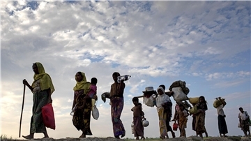 Flüchtende Rohingya aus Myanmar: Drangsaliert und teilweise zwangsrekrutiert.