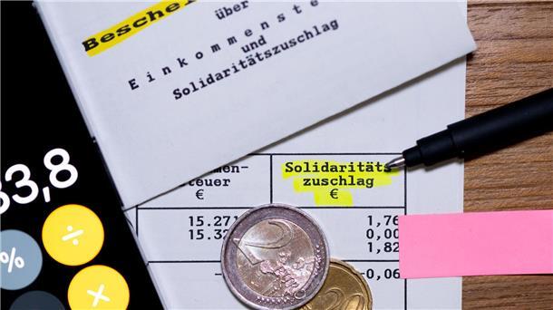 Aufatmen für Koalitionsverhandler: Soli darf vorerst bleiben Für 90 Prozent der Steuerpflichtigen wurde der Soli Ende 2020 bereits abgeschafft. (Symbolbild)