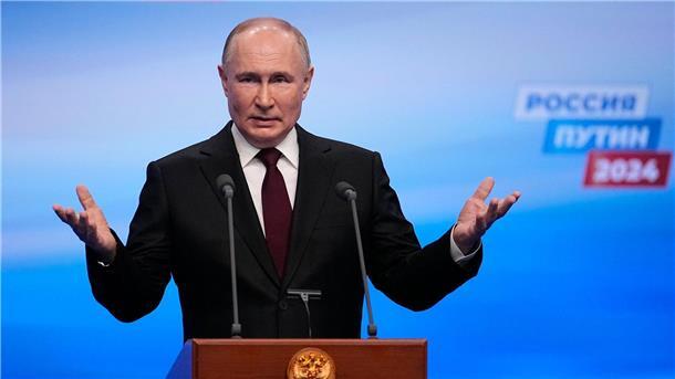 Russlands Wahlkommission spricht Putin Rekordergebnis zu Kremlchef Wladimir Putin wertet das Wahlergebnis als Vertrauensbeweis der Bürger.