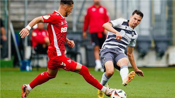 Mühsamer Premieren-Sieg für Struber: Köln schlägt Sandhausen Leart Paqarada im Duell mit seinem Ex-Club.