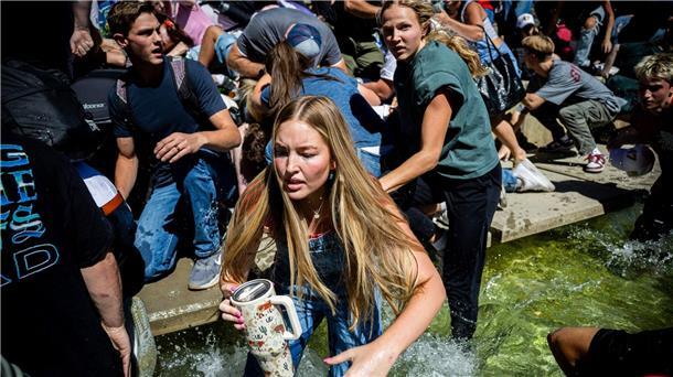 Menschen rennen weg, nachdem Kirk angeschossen wurde.