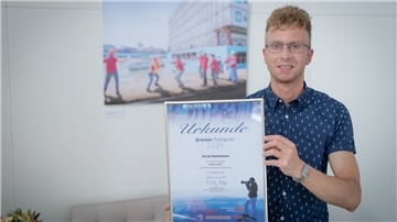 Arnd Hartmann, Bildjournalist, bei der Preisverleihung des Bremer Fotopreises. 