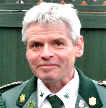 Porträtfoto von Ralf Bremer in Schützenuniform