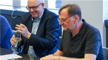 Regierungschef Andreas Bovenschulte (SPD, links) und SPD-Landeschef Reinhold Wetjen