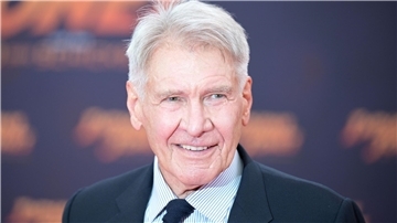 Schauspieler Harrison Ford steht auf dem roten Teppich bei der Deutschlandpremiere des Films „Indiana Jones und das Rad des Schicksals“ im Zoo Palast in Berlin.