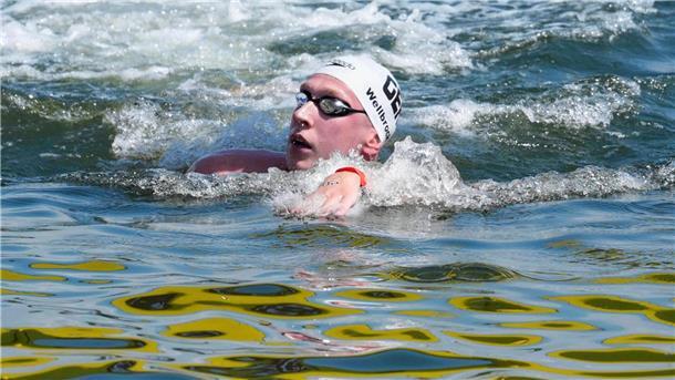 Zweites Mal Gold dank spezieller Vorbereitung Schwimmer Florian Wellbrock kämpft sich durch das warme Wasser.