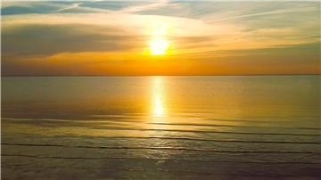 Sonnenuntergang am Wasser