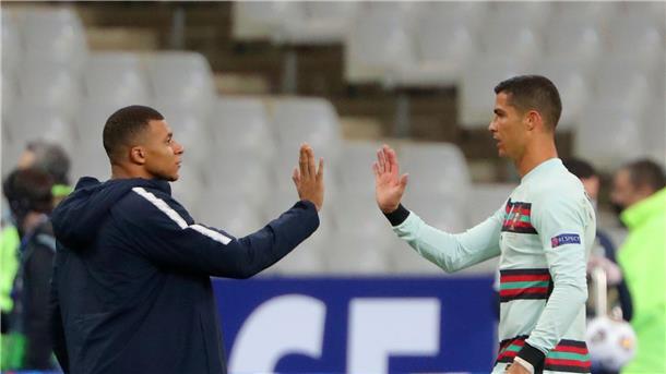 Ronaldo gegen Mbappé: Giganten-Duell in Hamburg Treffen im EM-Viertelfinale aufeinander: Frankreichs Kylian Mbappé (l) und Portugals Cristiano Ronaldo.