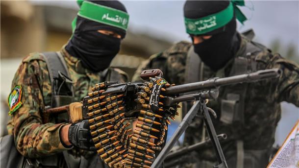 Militärischer Hamas-Arm: Nicht für Angriffe verantwortlich Vermummte Kämpfer der Kassam-Brigaden, des militärischen Flügels der islamistischen Terrororganisation Hamas. (Archivbild)