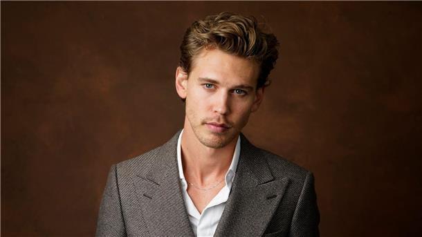 Zeichen moderner Männlichkeit oder bloße Gender-Performance? US-Schauspieler Austin Butler trägt - wie derzeit viele Geschlechtsgenossen - zum klassischen Anzug Goldkettchen.